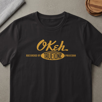 Black t-shirt with "OKeh" and "Recorded by True Tone Process" text.