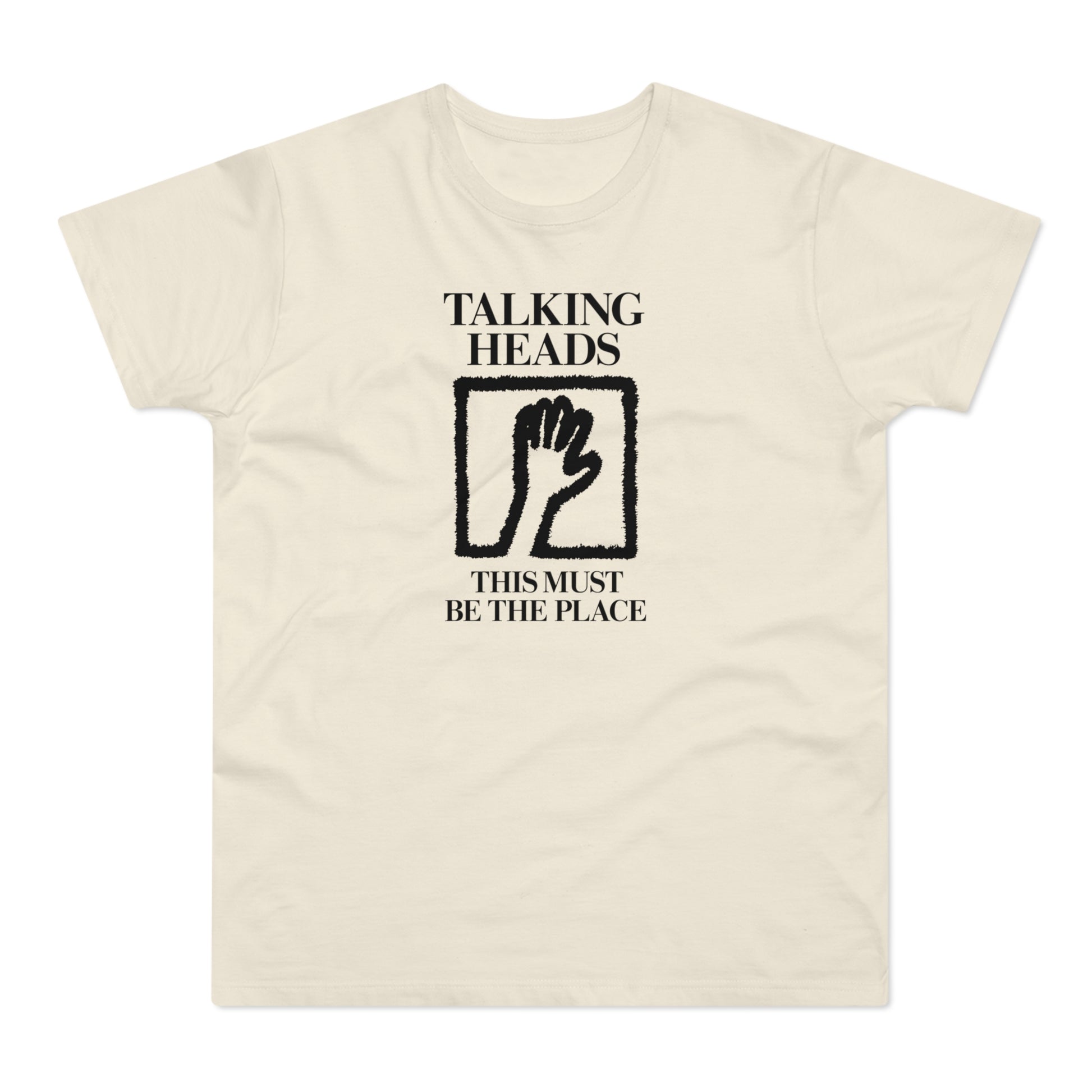 Talking Heads t-shirt with black text and hand graphic.