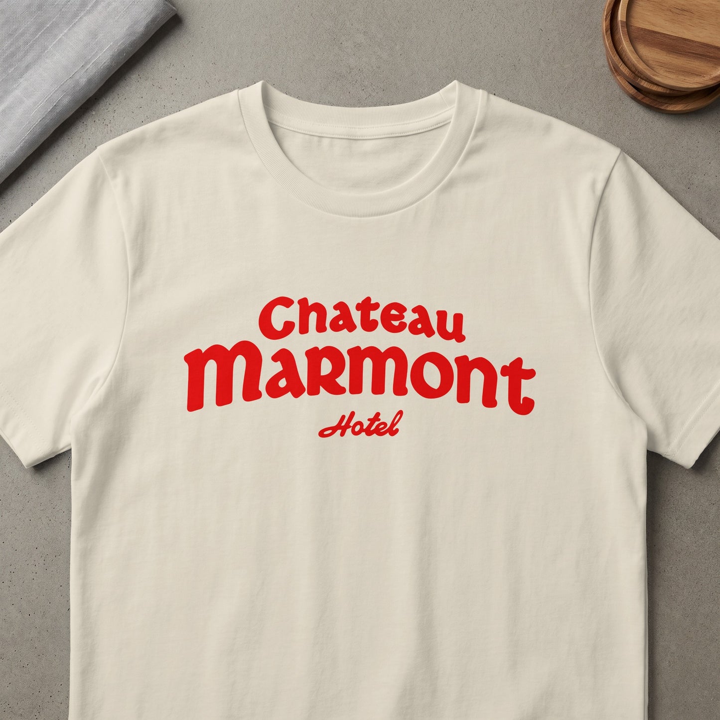 Chateau Marmont Hotel text on a cream t-shirt.