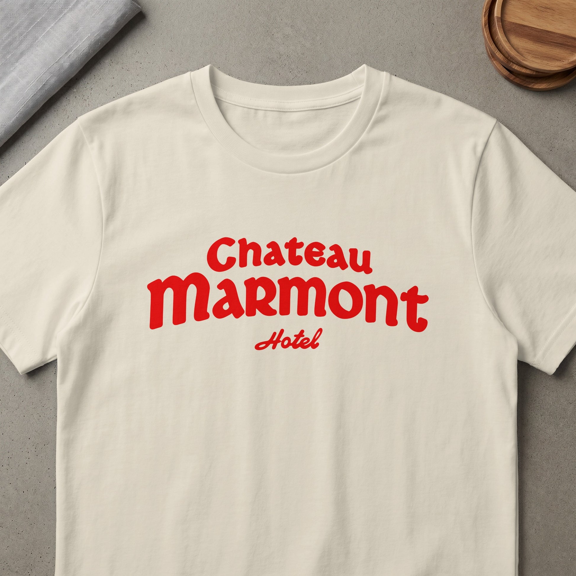 Chateau Marmont Hotel text on a cream t-shirt.