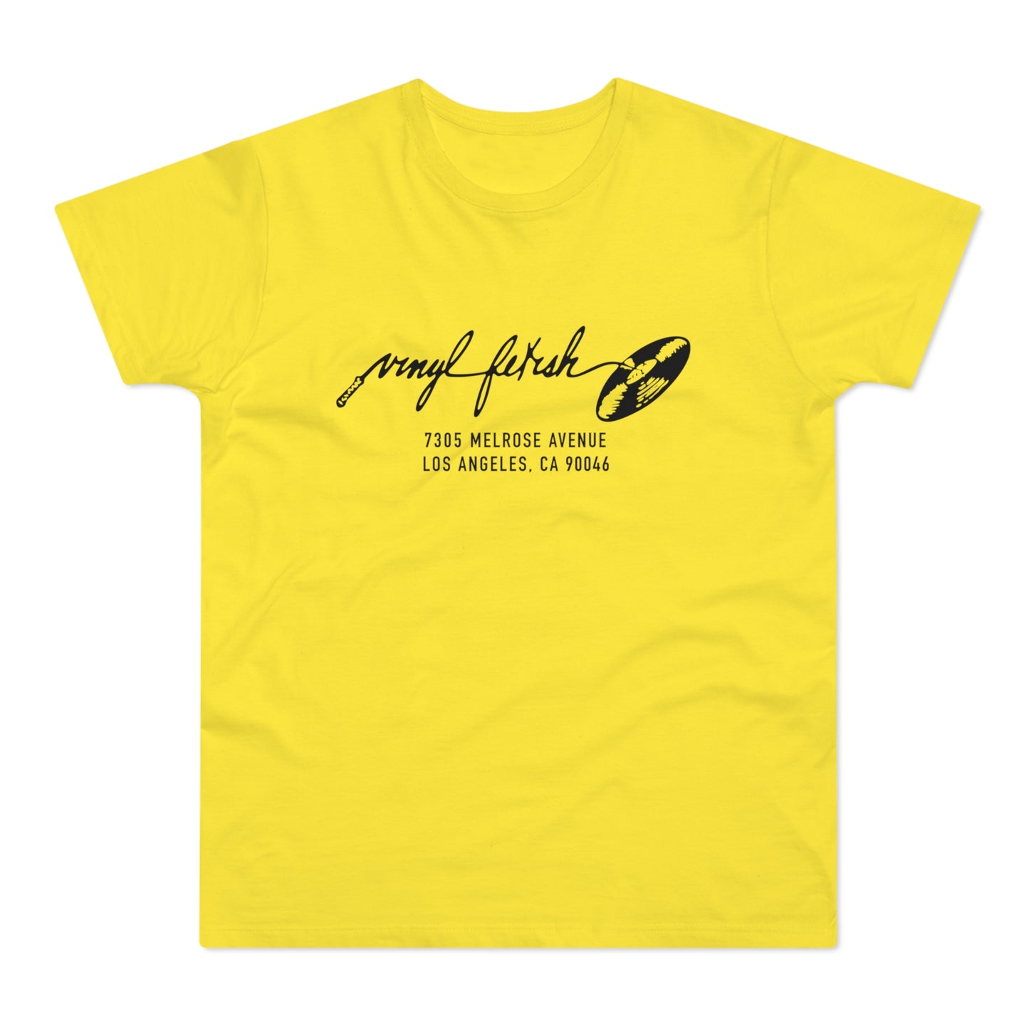 Yellow t-shirt with black graphic: "vinyl fetish" and address 7305 Melrose Avenue, Los Angeles.