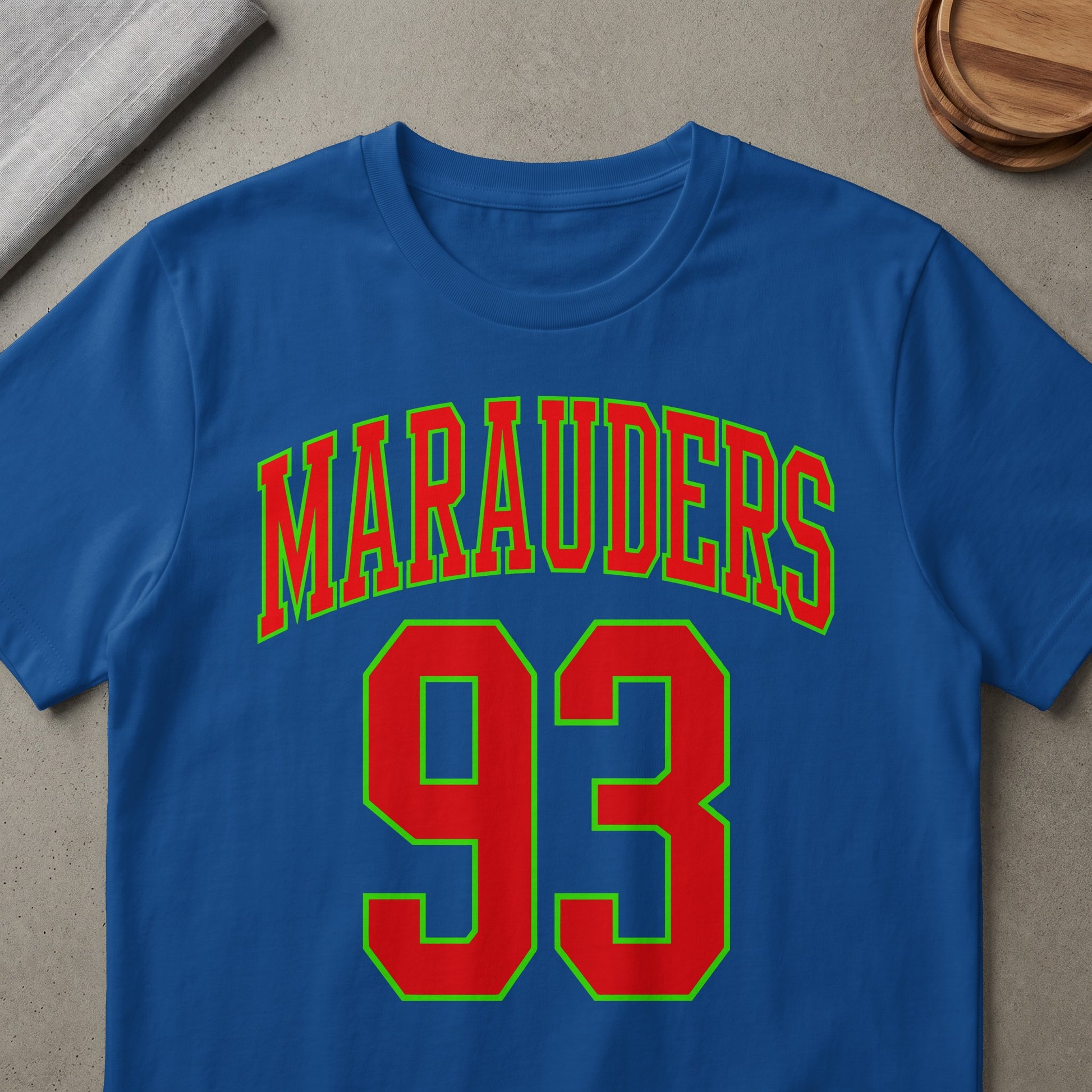 Royal blue t-shirt with red and green "Marauders 93" text.