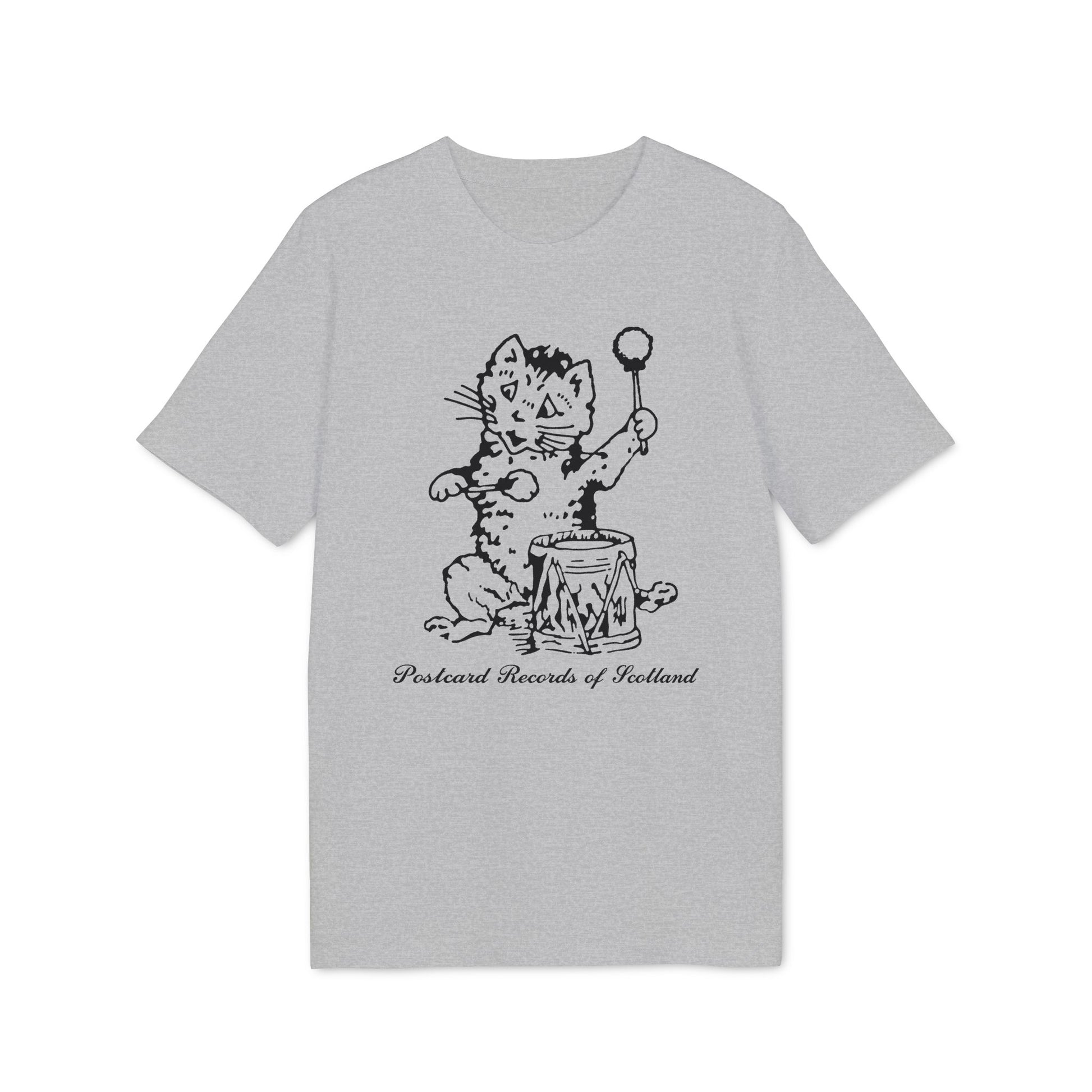 Grey t-shirt with a black illustration of a cat playing a drum, with text below.