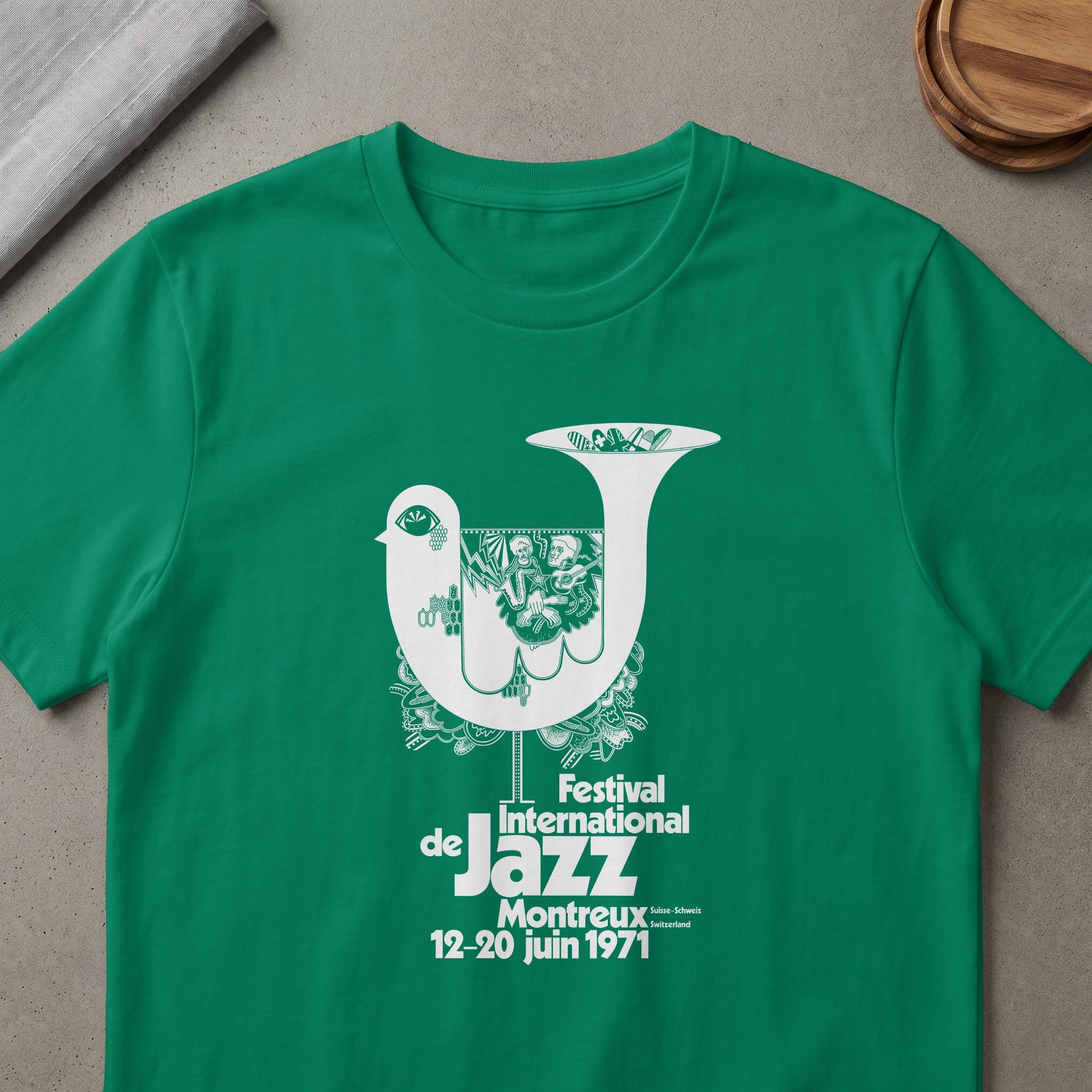 Green t-shirt with white graphic: Festival International de Jazz Montreux 12-20 juin 1971.