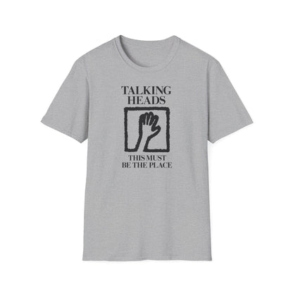Grey t-shirt with "Talking Heads" and "This Must Be the Place" text and a hand graphic.