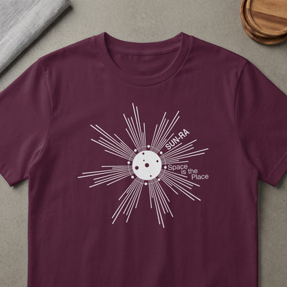 Maroon t-shirt with white Sun-Ra graphic and text "Space is the Place".