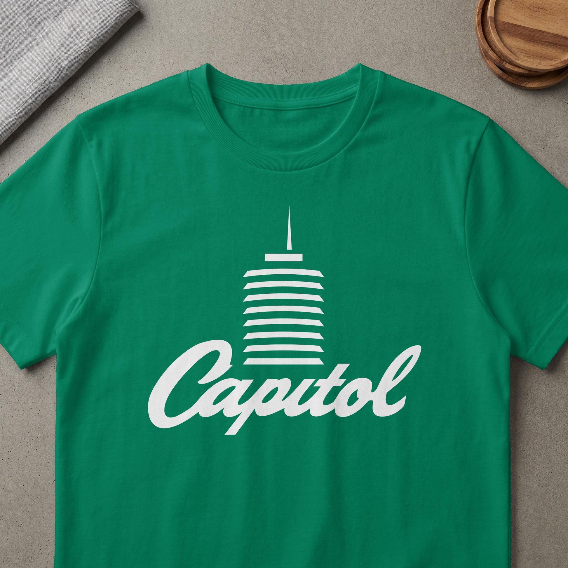 Green t-shirt with white Capitol Records building logo and text.