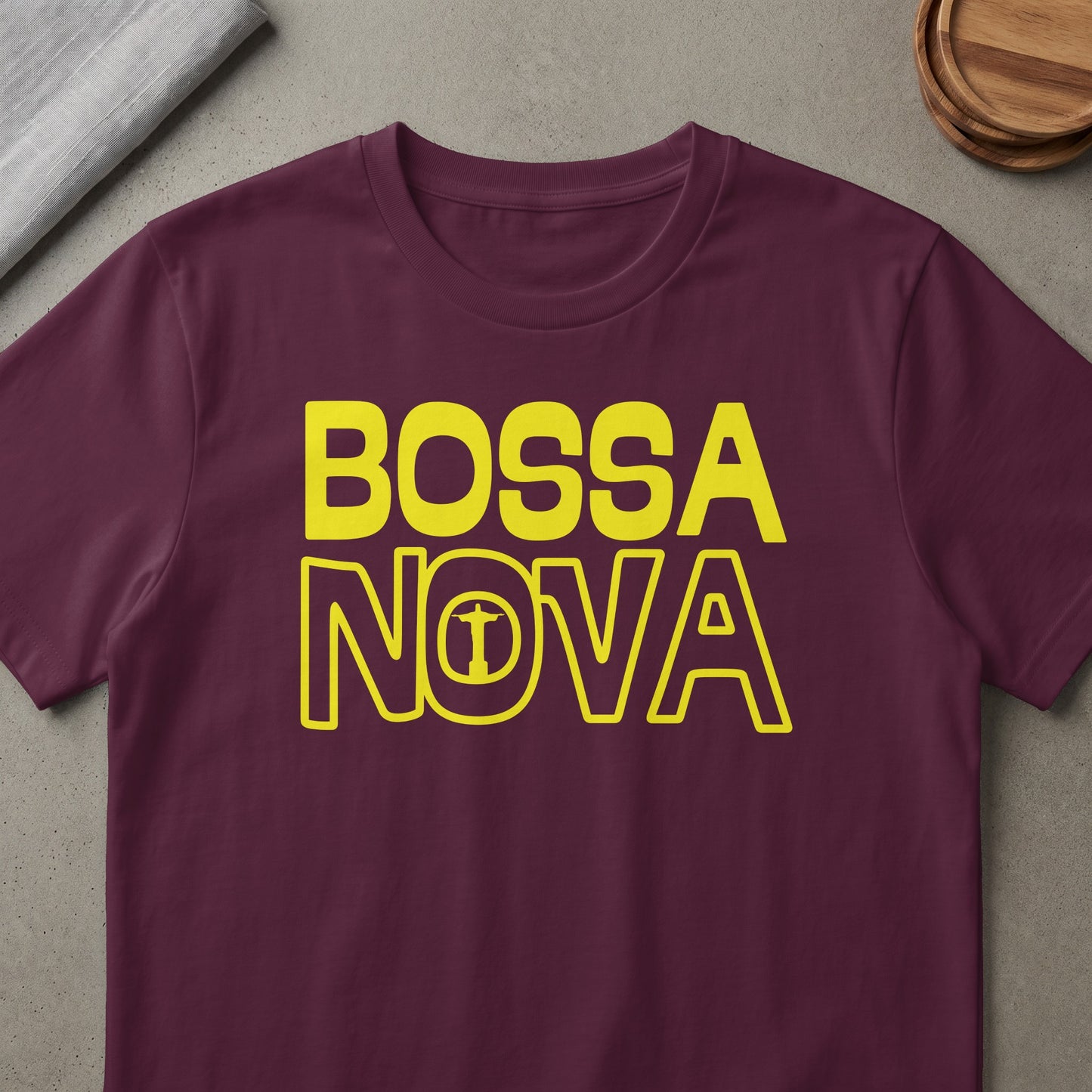 Maroon t-shirt with "BOSSA NOVA" text and Christ the Redeemer icon.