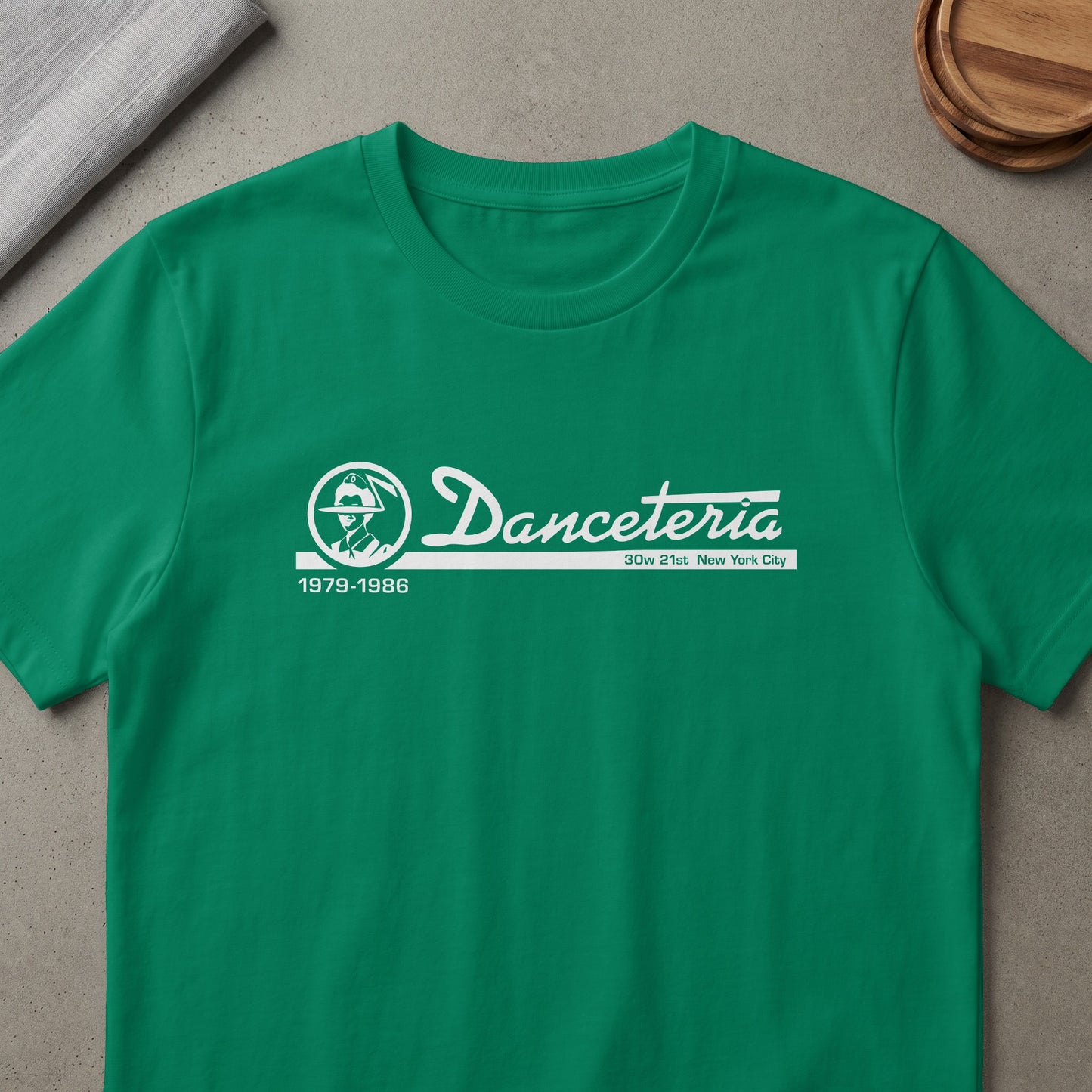 Green t-shirt with white "Danceteria" text, logo, and "1979-1986" details.