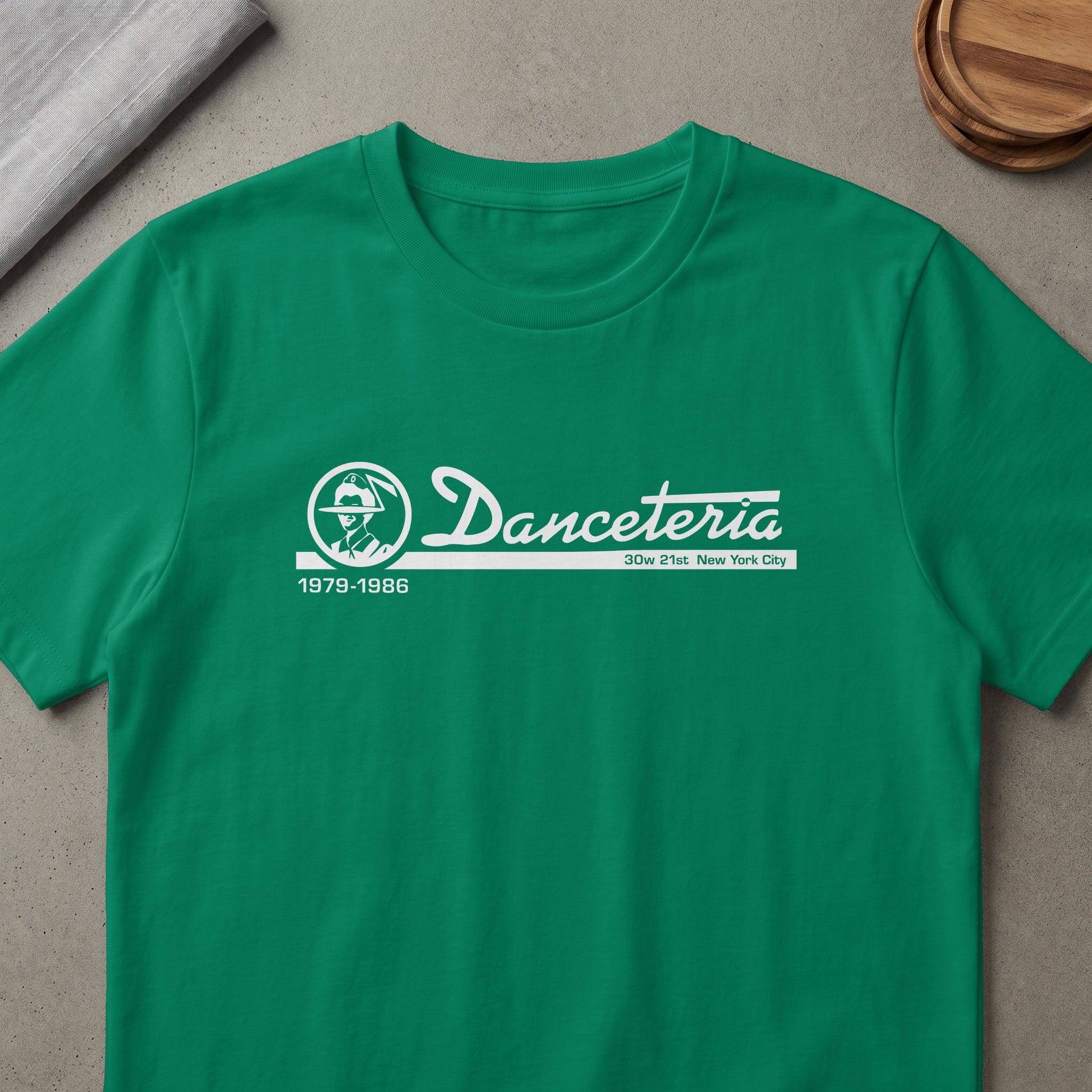 Green t-shirt with white "Danceteria" text, logo, and "1979-1986" details.