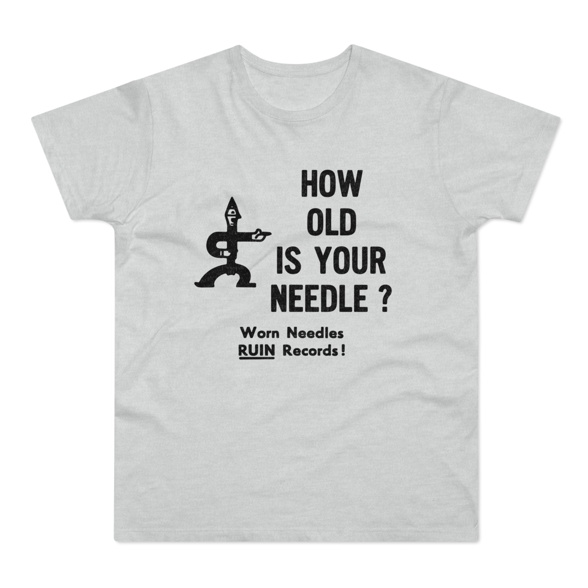 Light grey t-shirt with black graphic text "HOW OLD IS YOUR NEEDLE?" and warning.