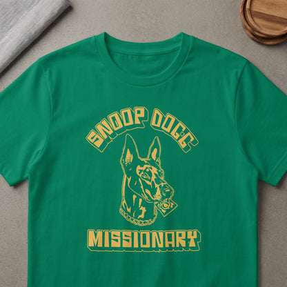 Green t-shirt with gold "Snoop Dogg Missionary" text and a dog head graphic.