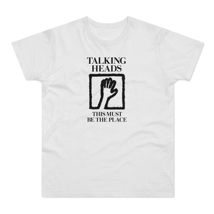 White t-shirt black text "TALKING HEADS" and fuzzy hand in square.
