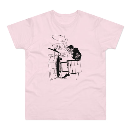 Black ink sketch of a drummer playing a drum set against a pink t-shirt.
