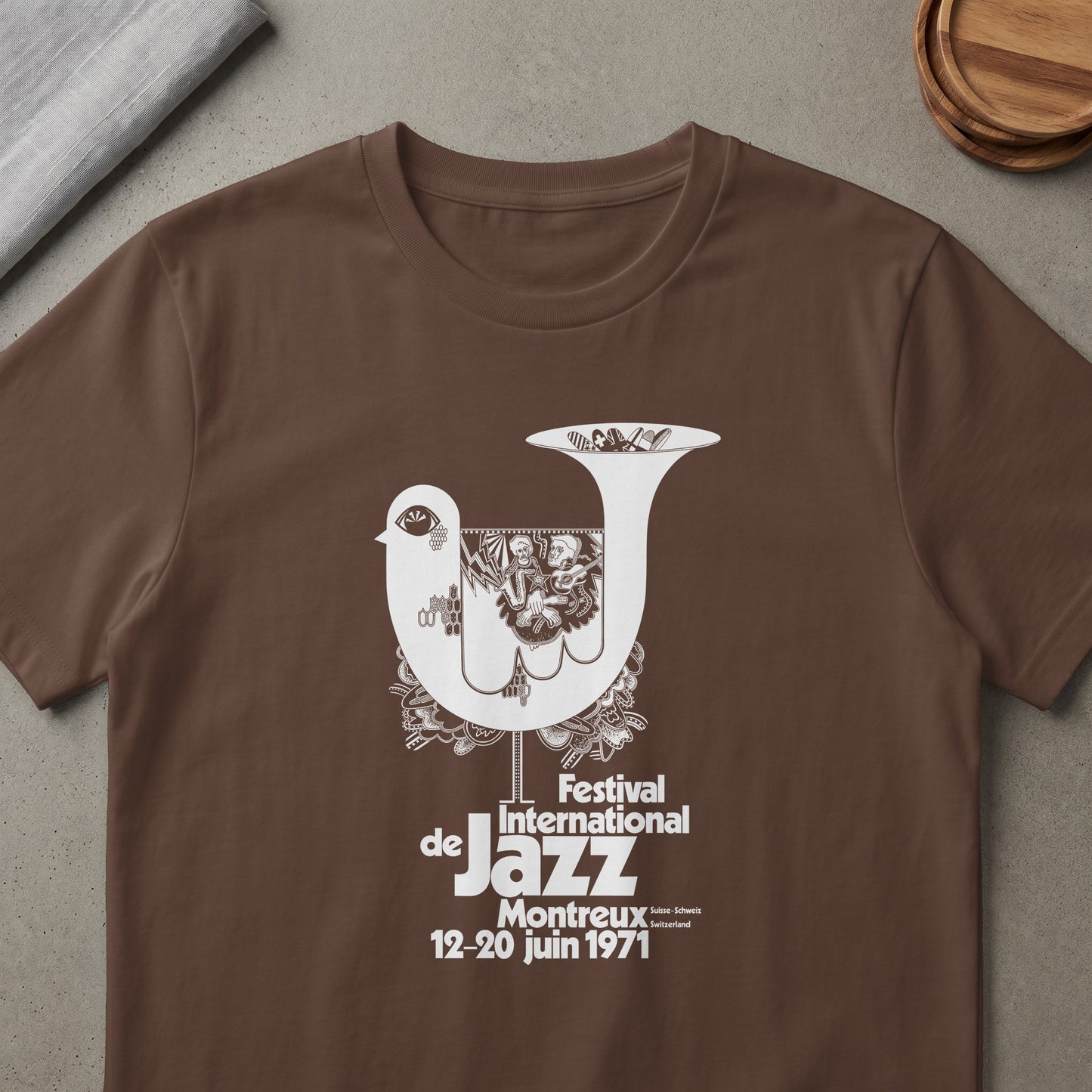Brown t-shirt featuring white Montreux Jazz Festival 1971 design with a stylized bird.